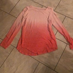 Ism selling a girls shirt